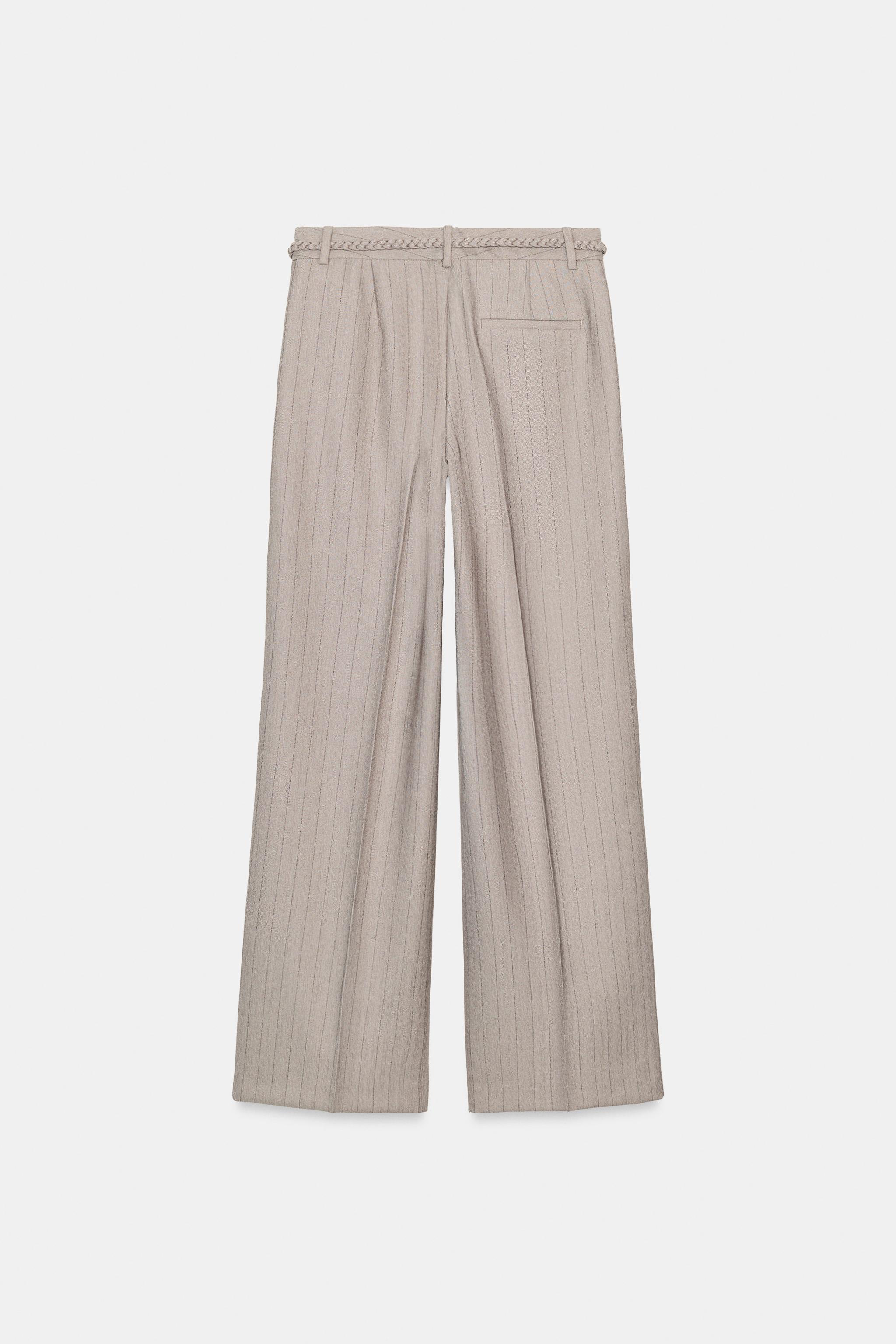PANTALON CHEVRON AVEC CEINTURE TRESSÉE